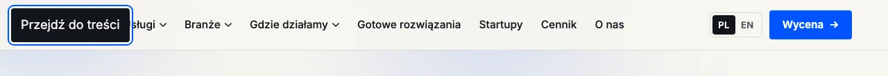 Po pierwszym naciśnięciu Tab w lewym górnym rogu strony pojawia się ciemny przycisk „Przejdź do treści” z niebieską obwódką